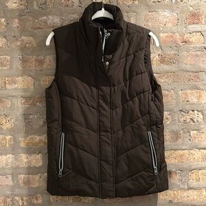 Olive green/brown vest with detachable furry hood. Hardly worn - great condition